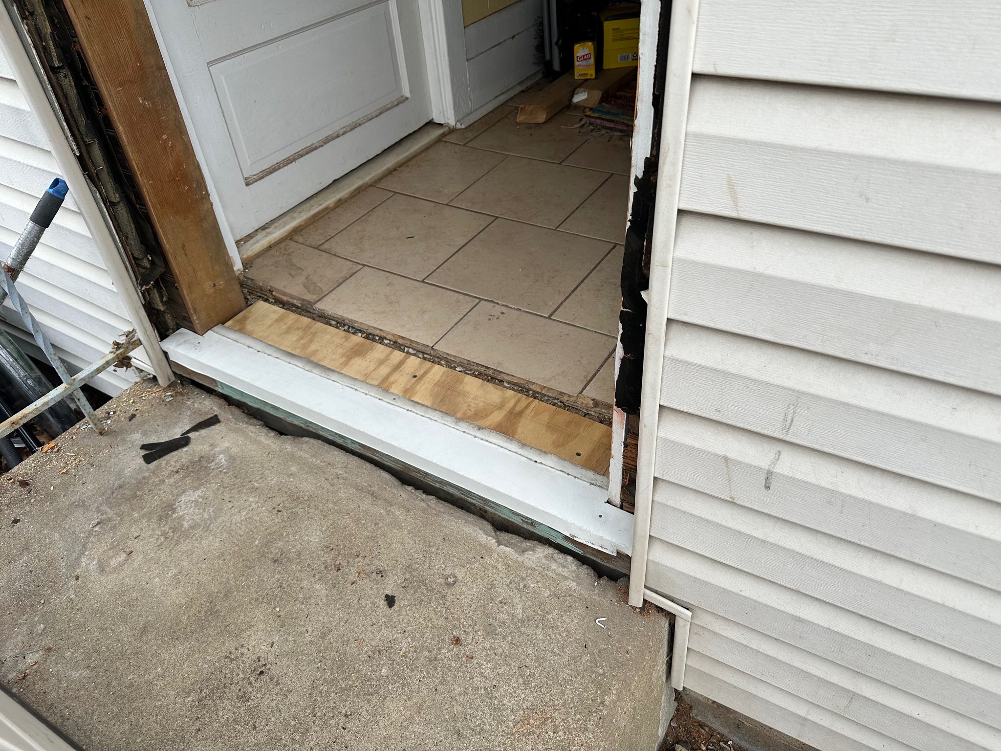 Exterior door opening during demo and threshold repair