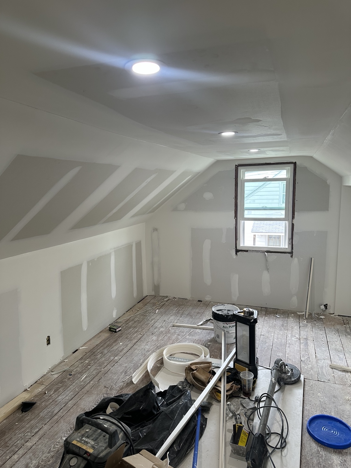 Drywall repair finish coat before final sanding