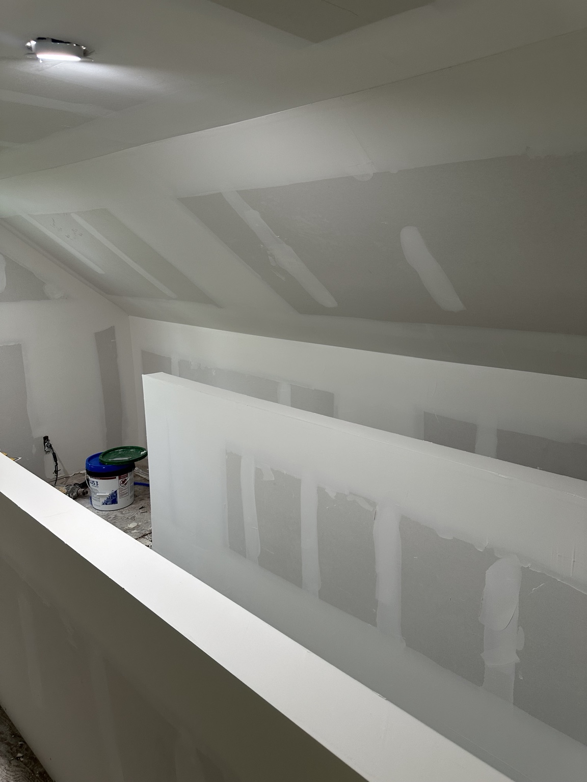 Drywall repair progress with compound and patching in South Jersey