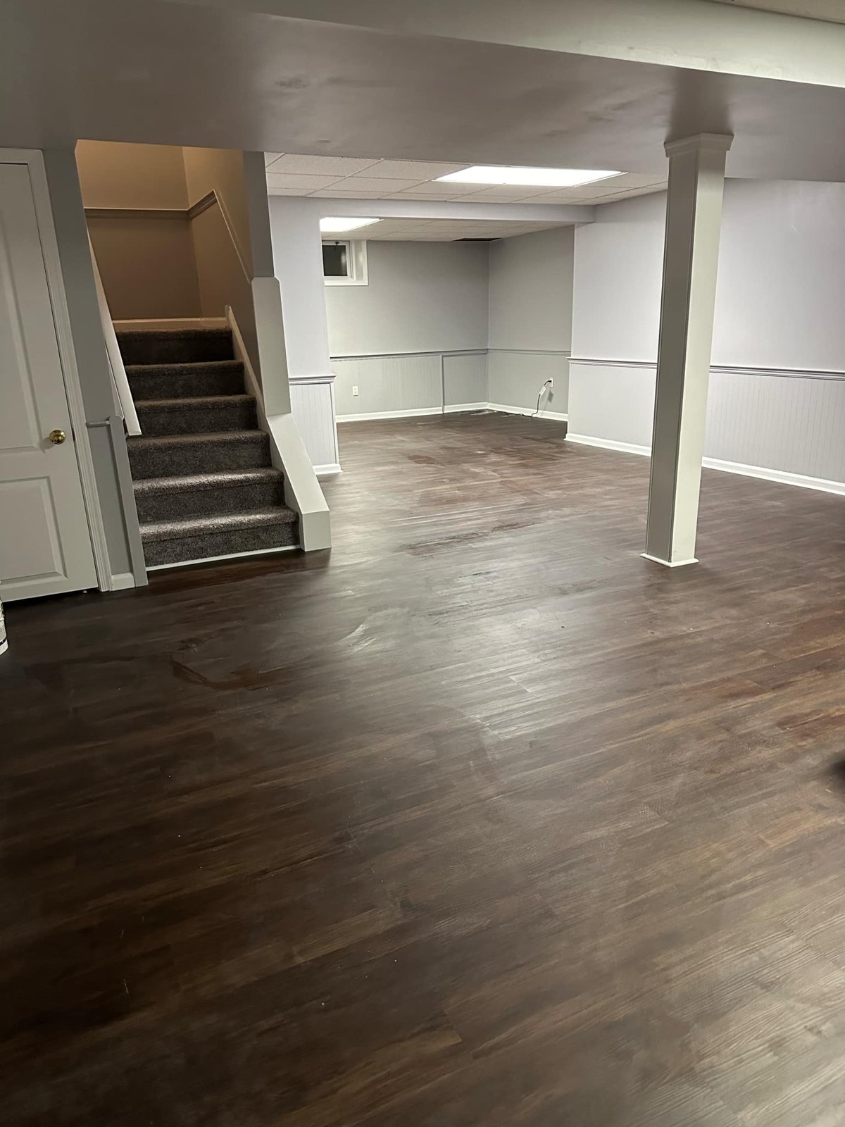 Finished basement flooring, trim, and interior refresh